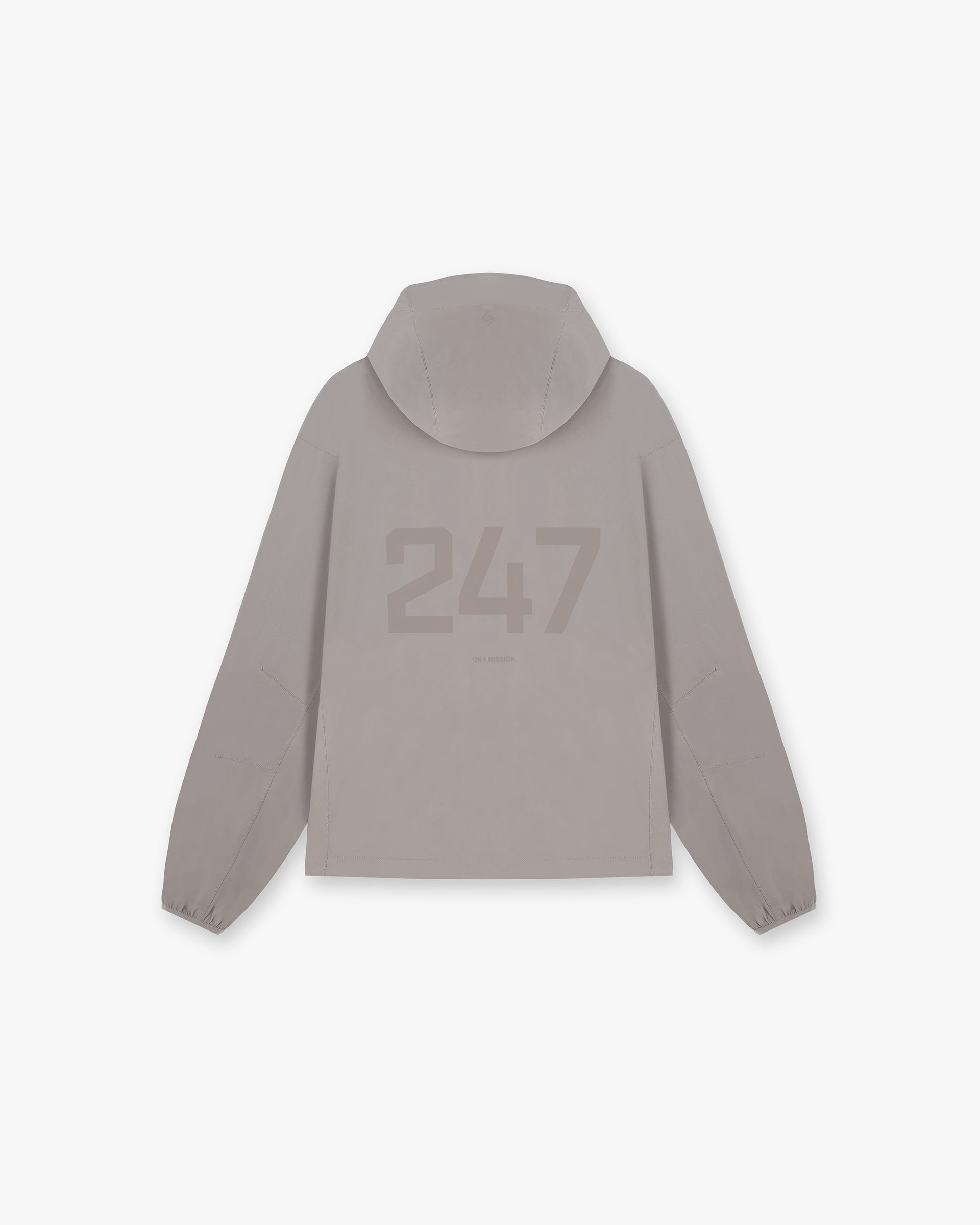 Back product image of a mens grey hooded training jacket on a plain white background | 247 Hooded Training Jacket in Cinder | Nylon jacket with DWR coating and adjustable hem | 247 Outerwear | Represent Clo